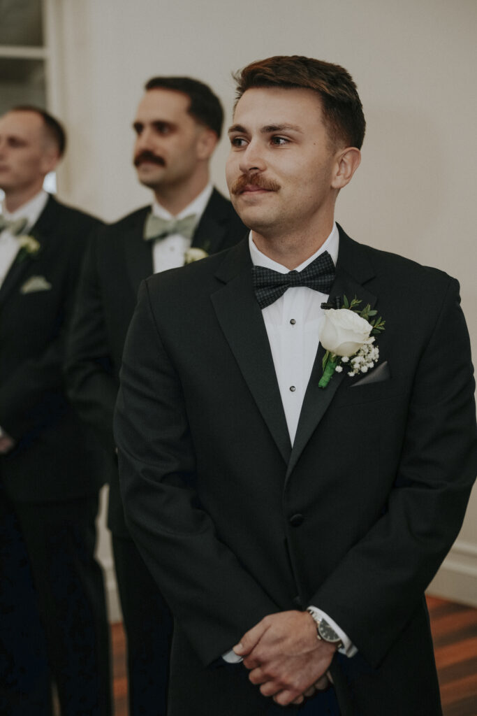 groom waiting for the bride at ceremony